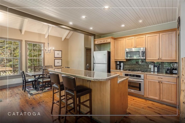 61 Indian Falls Way, Lake Toxaway, NC 28747 - kitchen featuring stainless steel appliances, wooden ceiling, a kitchen island, a chandelier, and backsplash