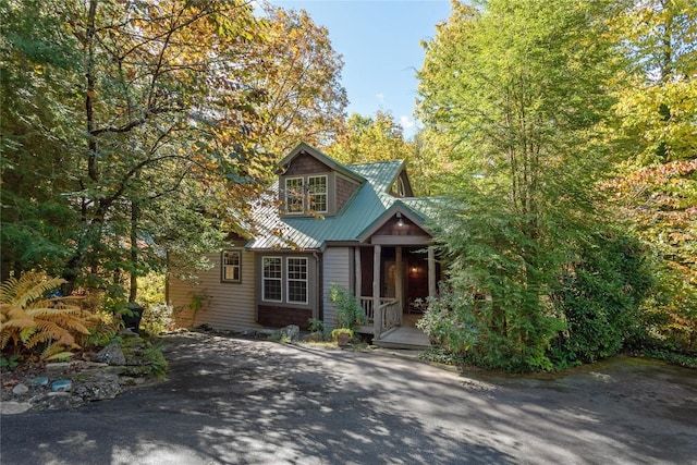 61 Indian Falls Way, Lake Toxaway, NC 28747 - view of front of home featuring a metal roof and covered porch