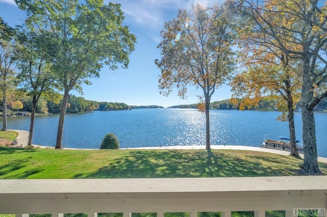 property view of water with a dock