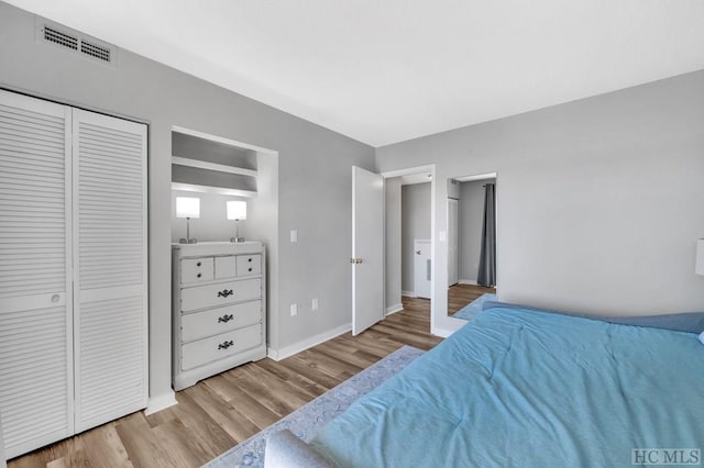 bedroom featuring light hardwood / wood-style floors