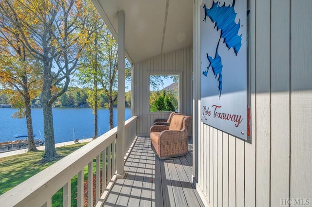 balcony featuring a water view