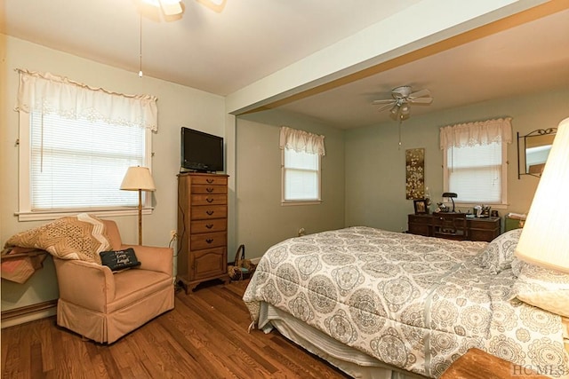 bedroom with hardwood / wood-style flooring and ceiling fan