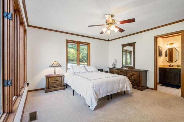 776 Stillmont Cir, Cashiers, NC 28717 - bedroom with baseboards, ornamental molding, light carpet, visible vents, and a sink