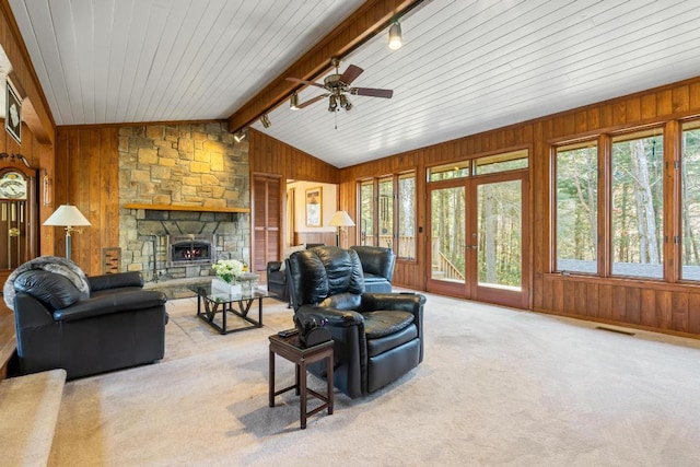 776 Stillmont Cir, Cashiers, NC 28717 - carpeted living area featuring a wealth of natural light, wood walls, and vaulted ceiling with beams