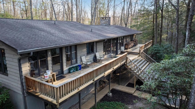 776 Stillmont Cir, Cashiers, NC 28717 - back of property with a shingled roof, stairway, and a chimney