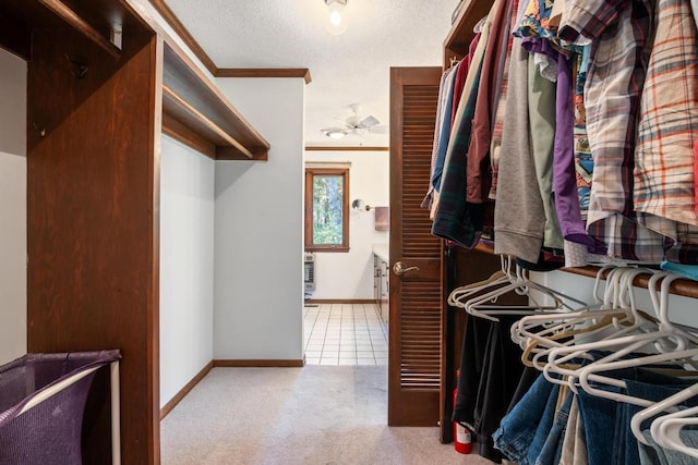 776 Stillmont Cir, Cashiers, NC 28717 - walk in closet featuring tile patterned floors and carpet flooring