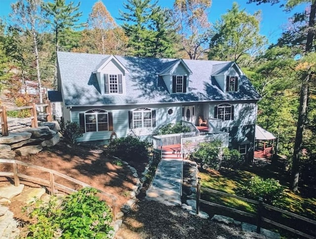 11 Lower Tanglewood Dr E, Lake Toxaway, NC 28747 - cape cod-style house featuring fence