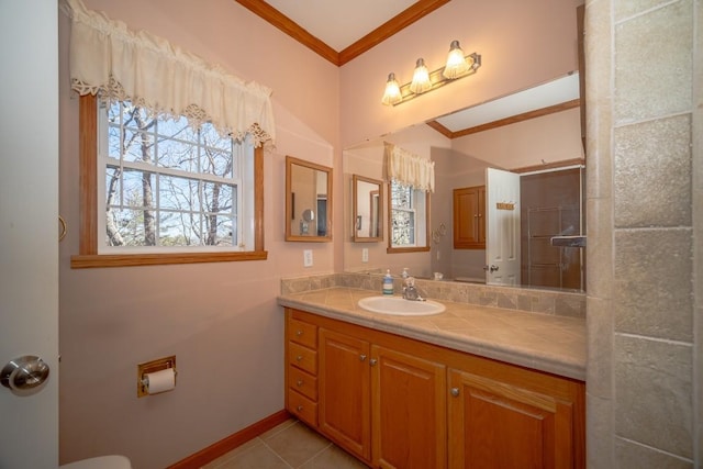 11 Lower Tanglewood Dr E, Lake Toxaway, NC 28747 - bathroom featuring crown molding, vanity, tile patterned flooring, and a healthy amount of sunlight