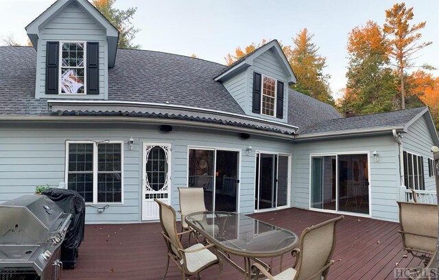 11 Lower Tanglewood Dr E, Lake Toxaway, NC 28747 - exterior space featuring outdoor dining area, a shingled roof, and a wooden deck