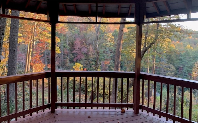 11 Lower Tanglewood Dr E, Lake Toxaway, NC 28747 - wooden terrace featuring a wooded view