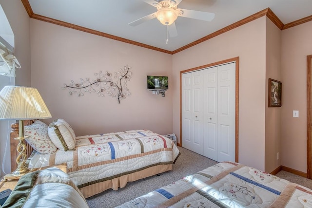 11 Lower Tanglewood Dr E, Lake Toxaway, NC 28747 - bedroom featuring baseboards, a closet, crown molding, carpet floors, and ceiling fan