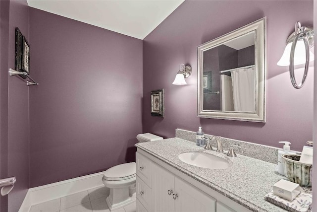 bathroom with baseboards, toilet, a shower with shower curtain, tile patterned floors, and vanity