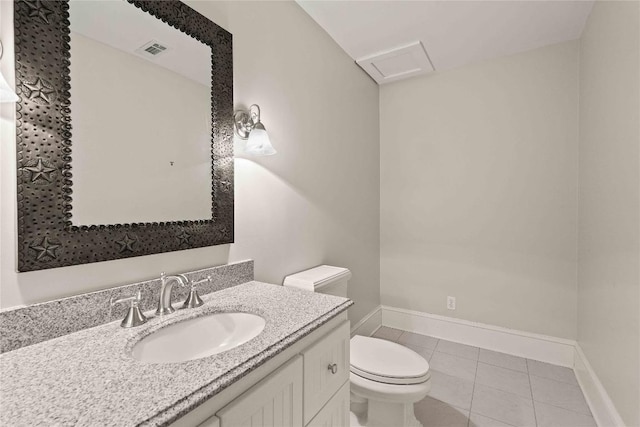 half bath featuring vanity, baseboards, visible vents, tile patterned flooring, and toilet