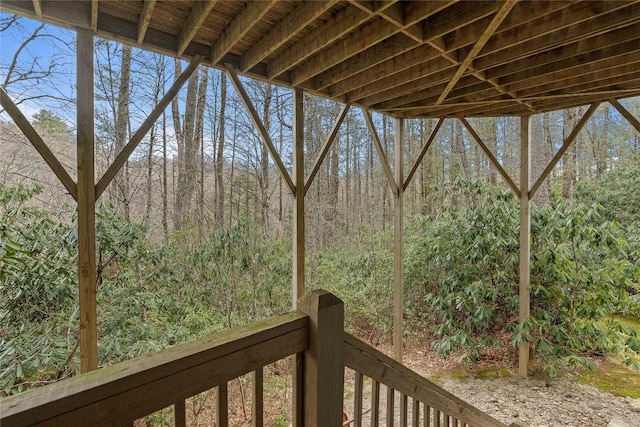 view of yard featuring a forest view