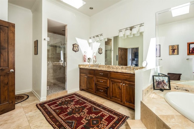 full bath featuring a shower stall, crown molding, vanity, a bath, and baseboards
