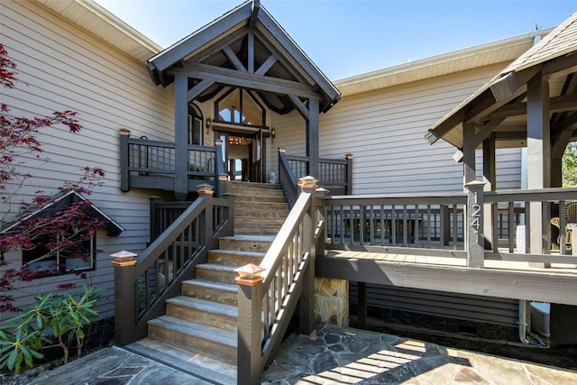 entrance to property with a deck