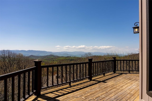 wooden terrace featuring a mountain view