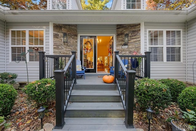 doorway to property with a porch