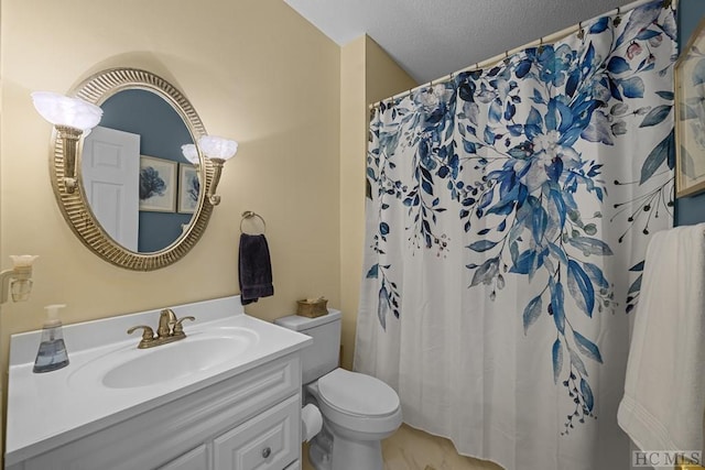 bathroom with vanity, a textured ceiling, toilet, and a shower with shower curtain