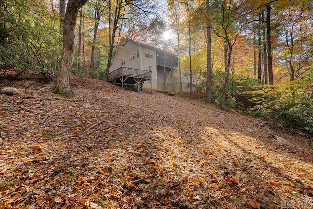 view of yard with a wooden deck