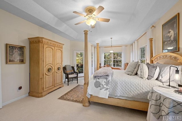 bedroom featuring light carpet and ceiling fan