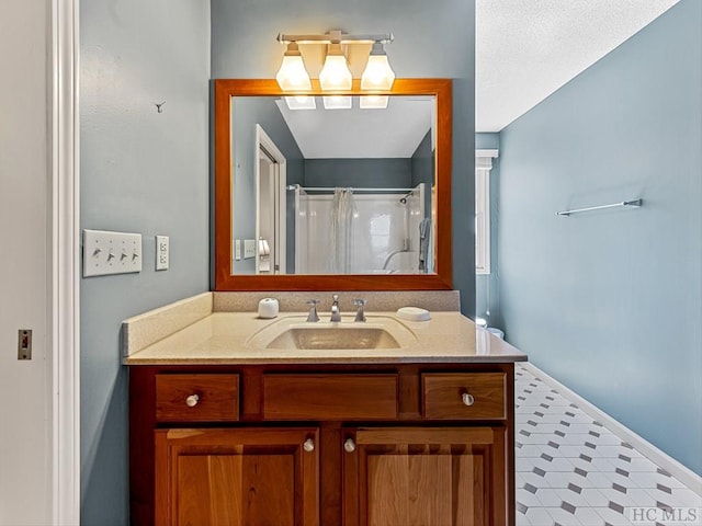 bathroom with vanity and curtained shower