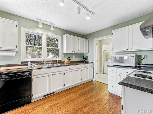 kitchen featuring sink, dishwasher, light hardwood / wood-style floors, a textured ceiling, and white cabinets