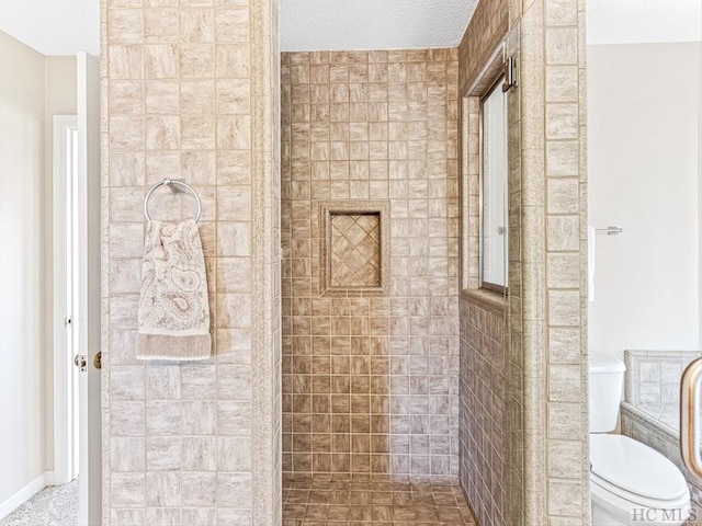 bathroom with walk in shower, toilet, and a textured ceiling