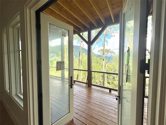 99 Sori Ln, Sapphire, NC 28774 - doorway featuring healthy amount of natural light, wood-type flooring, and a wood ceiling with exposed beams