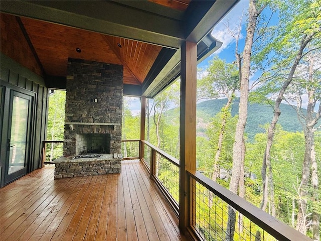 99 Sori Ln, Sapphire, NC 28774 - unfurnished sunroom featuring lofted ceiling and healthy amount of natural light