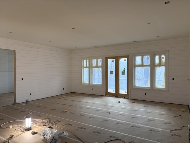 interior space featuring wooden walls