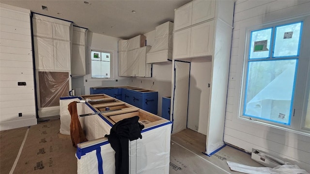 99 Sori Ln, Sapphire, NC 28774 - kitchen featuring custom exhaust hood and white cabinets