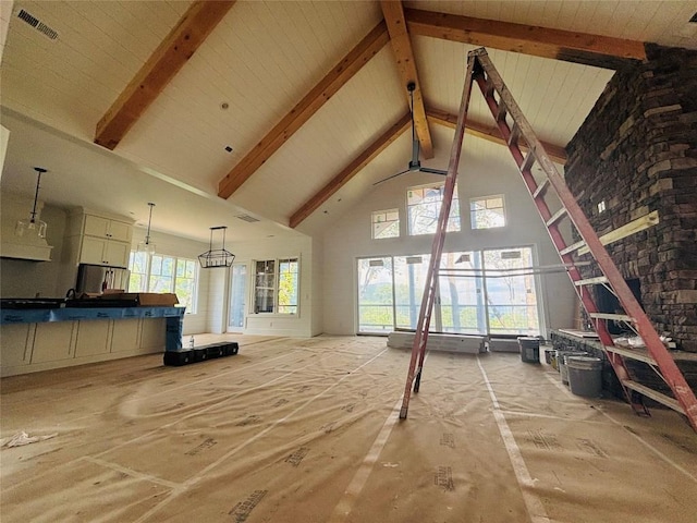 99 Sori Ln, Sapphire, NC 28774 - unfurnished living room with high vaulted ceiling and beamed ceiling