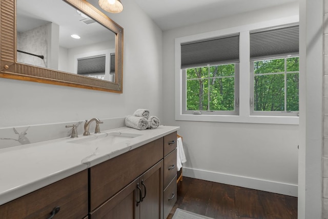 1582 New Settlers Way, Glenville, NC 28736 - bathroom with vanity, hardwood / wood-style floors, baseboards, and a shower