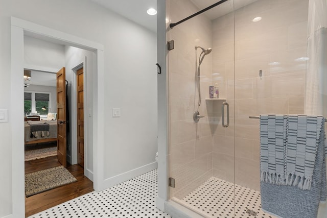 1582 New Settlers Way, Glenville, NC 28736 - ensuite bathroom featuring a stall shower, baseboards, and toilet
