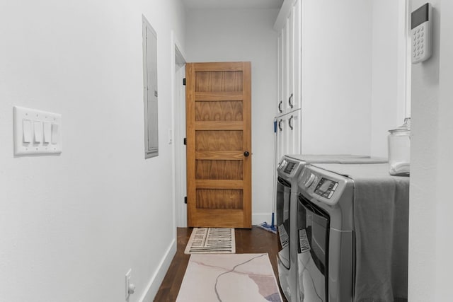 1582 New Settlers Way, Glenville, NC 28736 - laundry area with cabinet space, washer and dryer, dark wood finished floors, baseboards, and electric panel