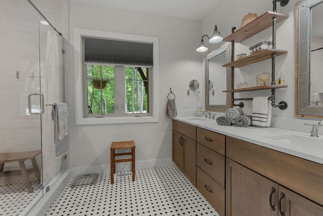 1582 New Settlers Way, Glenville, NC 28736 - full bathroom featuring a stall shower, double vanity, and baseboards