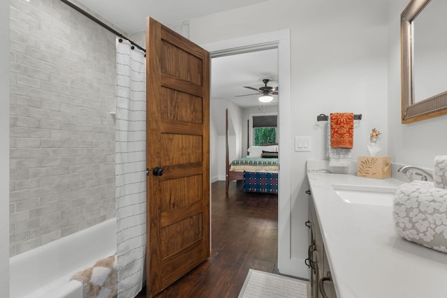 1582 New Settlers Way, Glenville, NC 28736 - bathroom featuring hardwood / wood-style flooring, vanity, ensuite bath, ceiling fan, and shower / bath combo