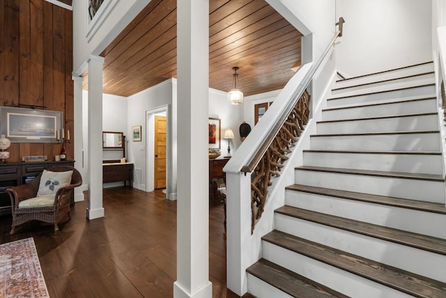 1582 New Settlers Way, Glenville, NC 28736 - stairway featuring decorative columns, wood finished floors, wood ceiling, crown molding, and baseboards