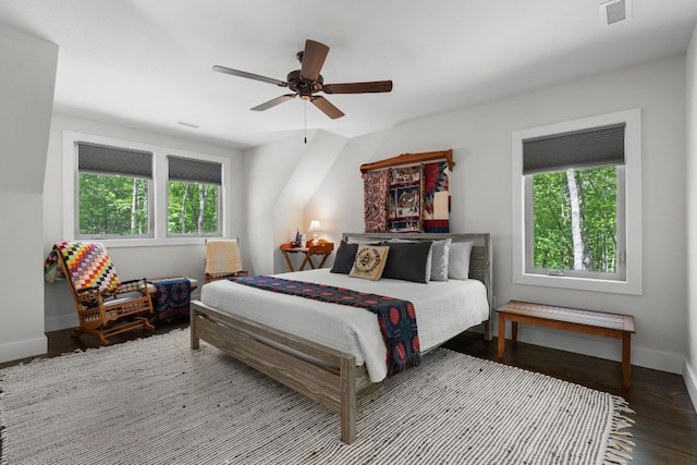 1582 New Settlers Way, Glenville, NC 28736 - bedroom with multiple windows, baseboards, wood finished floors, and a ceiling fan