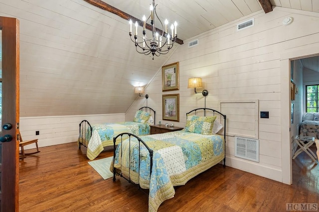 bedroom with a notable chandelier, wooden walls, hardwood / wood-style floors, and vaulted ceiling with beams