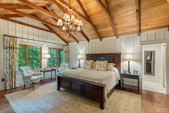 bedroom with beamed ceiling, a notable chandelier, light hardwood / wood-style flooring, and wooden ceiling