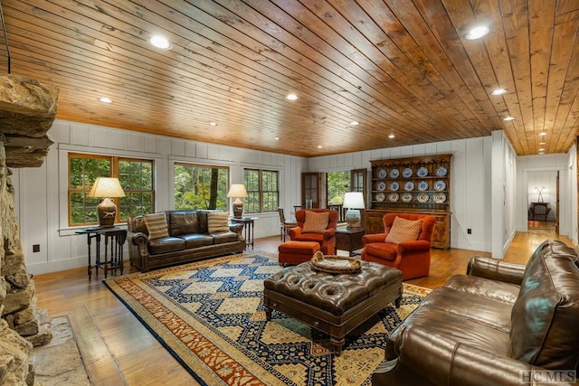 living room with light wood-type flooring and wood ceiling