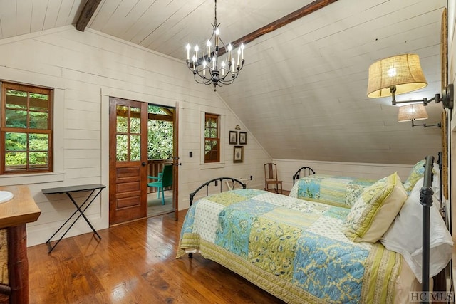 bedroom with wood walls, wood-type flooring, a notable chandelier, and vaulted ceiling with beams