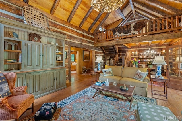 living room featuring an inviting chandelier, high vaulted ceiling, wood-type flooring, wood ceiling, and beam ceiling