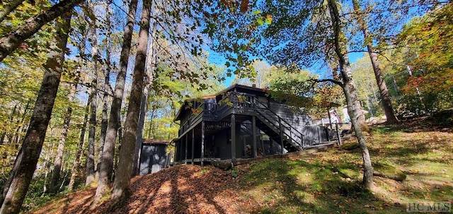 exterior space featuring a wooden deck