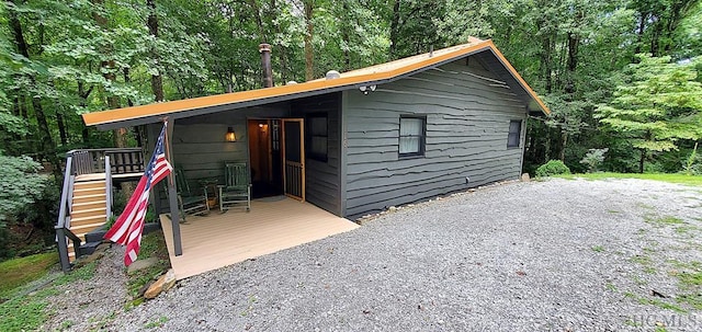 116 Shoal Creek Rd, Scaly Mountain, NC 28775 - view of outbuilding with a forest view
