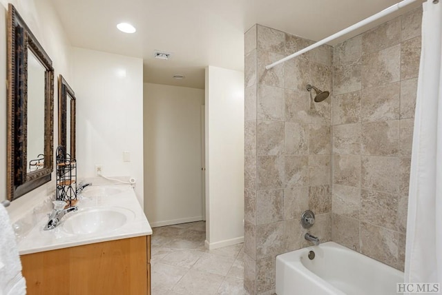 bathroom with vanity, tile patterned flooring, and shower / bath combo with shower curtain