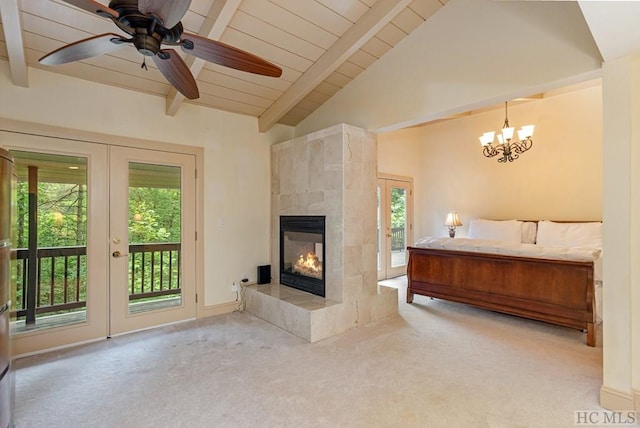 carpeted bedroom with beam ceiling, access to outside, french doors, and ceiling fan