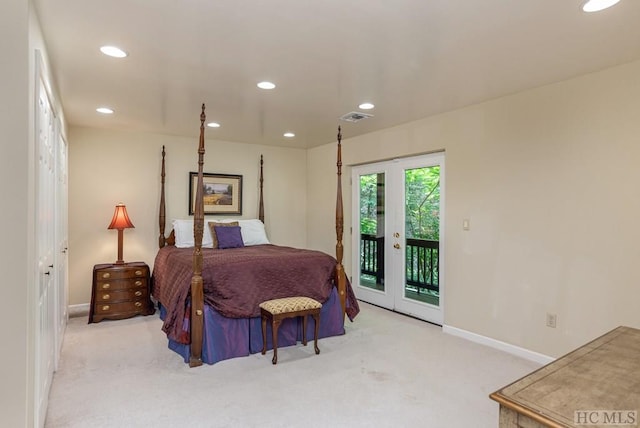 bedroom with light colored carpet and access to exterior